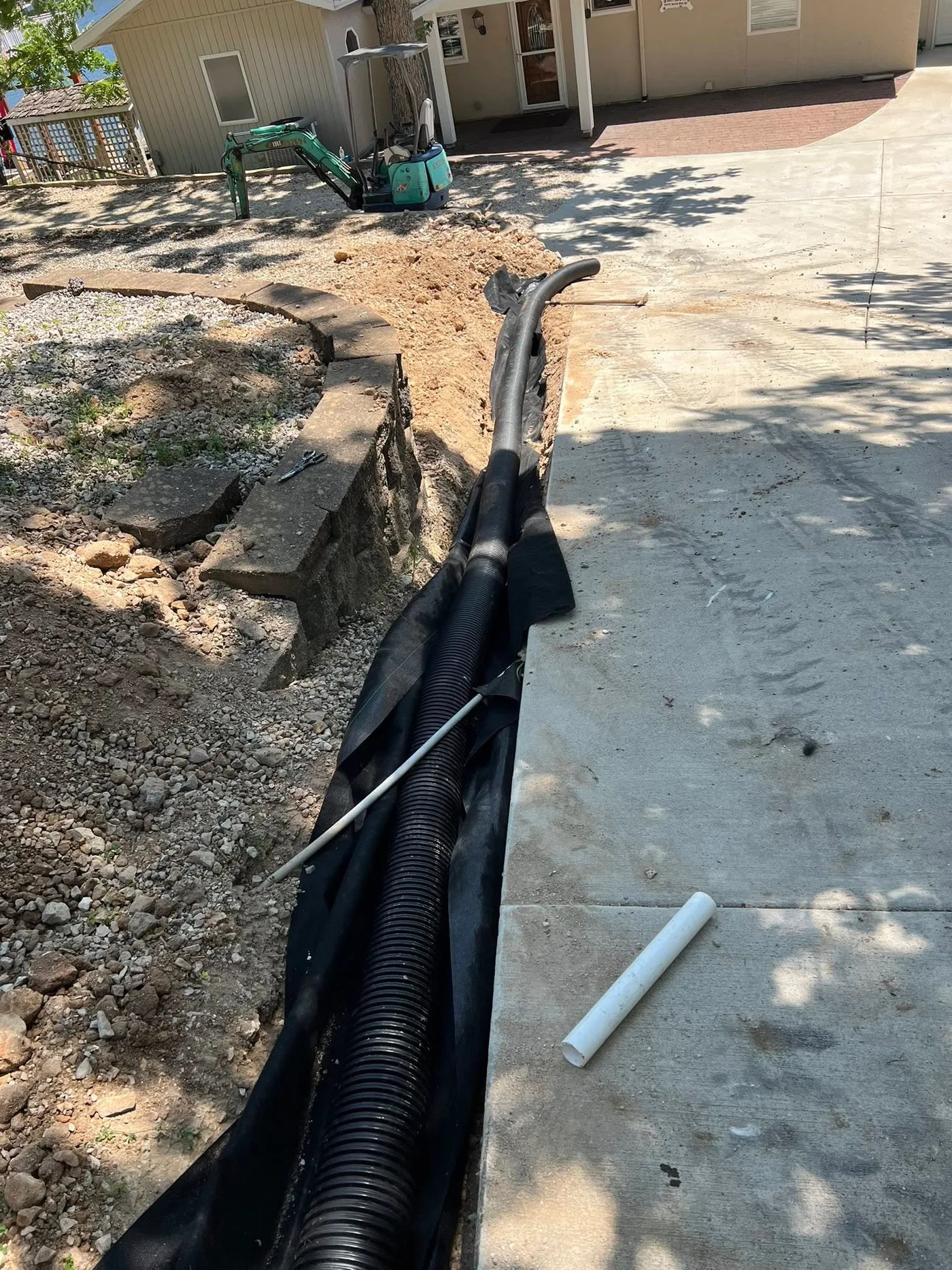 French drain project, job 1 — view 3 before and after photos