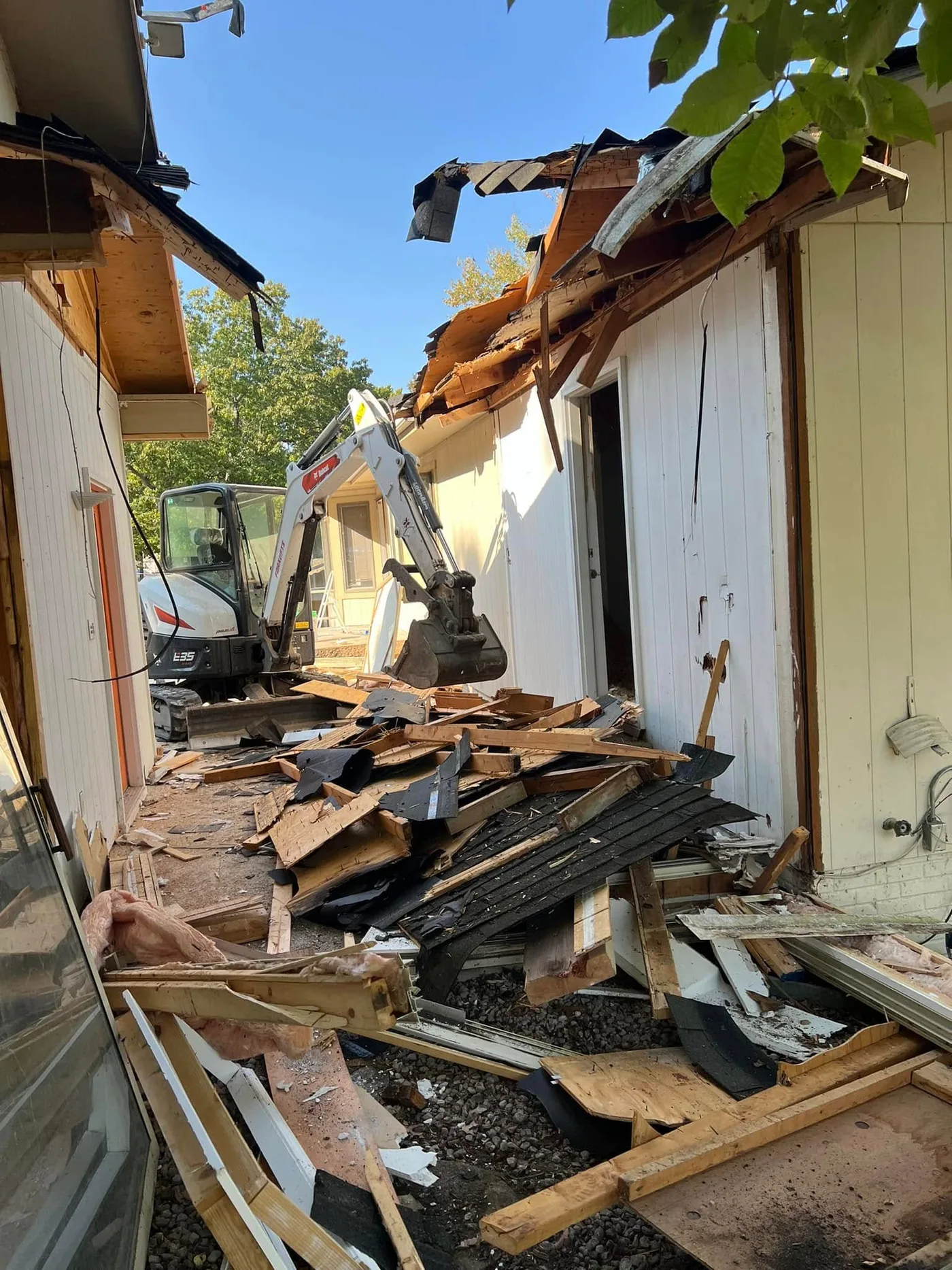 House demolition project — view 4 before and after photos